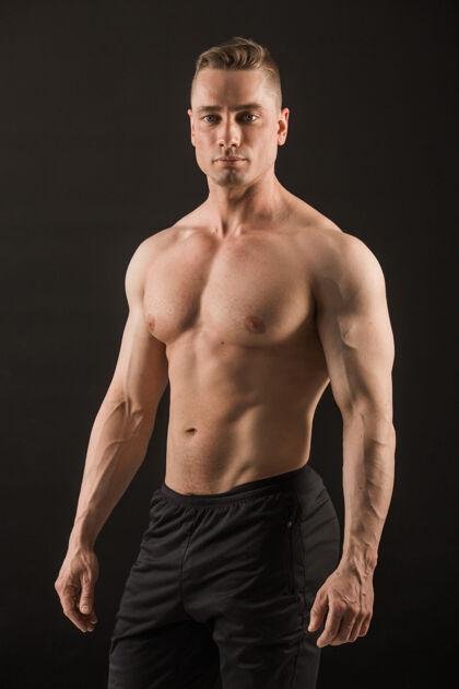 运动员黑底帅气肌肉男力量运动健身