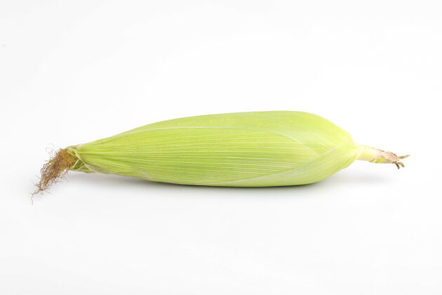 谷物玉米芯 白色表面有绿叶对角线膳食营养