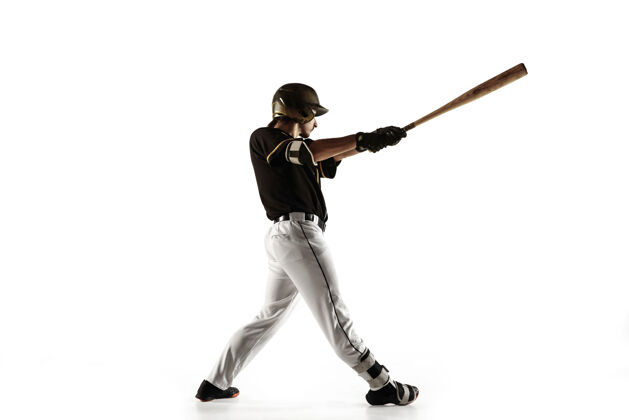 动作穿着黑色制服的棒球运动员在白色背景下练习和训练球头盔球员