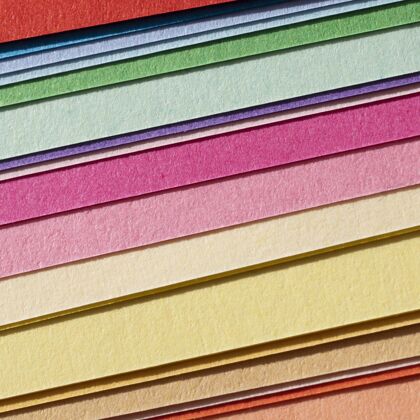 彩色层层叠叠的彩纸俯瞰纸张色彩复制空间