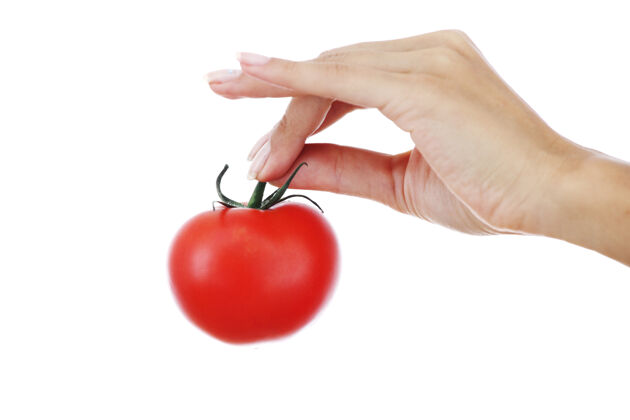 圆女人手里拿着西红柿西红柿明亮蔬菜