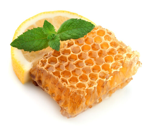 蜂蜜白色上有薄荷和柠檬的蜂巢柑橘打蜡留兰香
