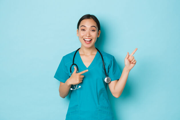 人年轻的亚洲女护士摆姿势女人成人保健