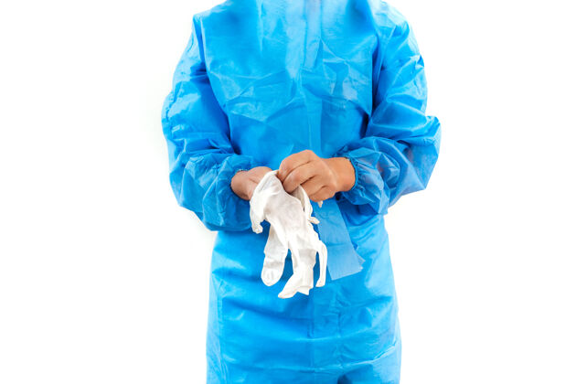疾病穿冠状病毒防护服的护士 在白色背景上戴上白色乳胶手套制服拷贝空间白手套