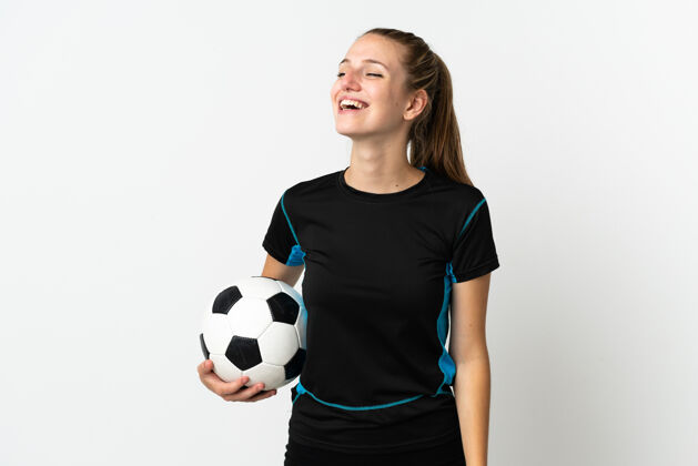 微笑年轻的足球运动员女子孤立在白色背景笑在横向位置青年年轻手势