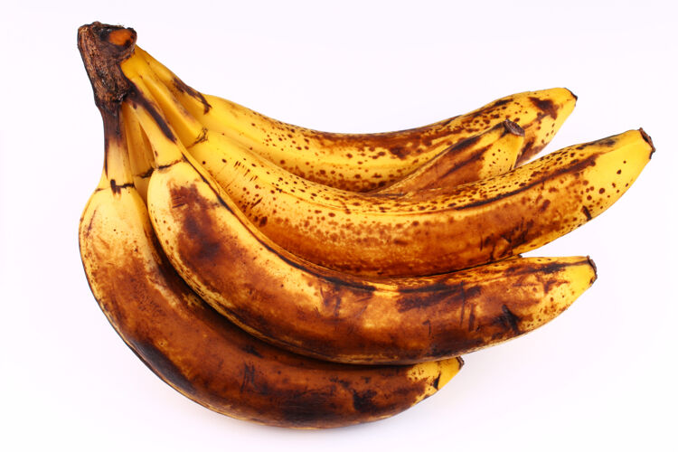变质白色表面上腐烂的香蕉特写坏水果零食
