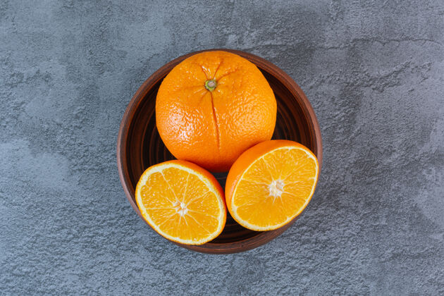 柑橘木碗里有机橙子的特写照片有机收获分类