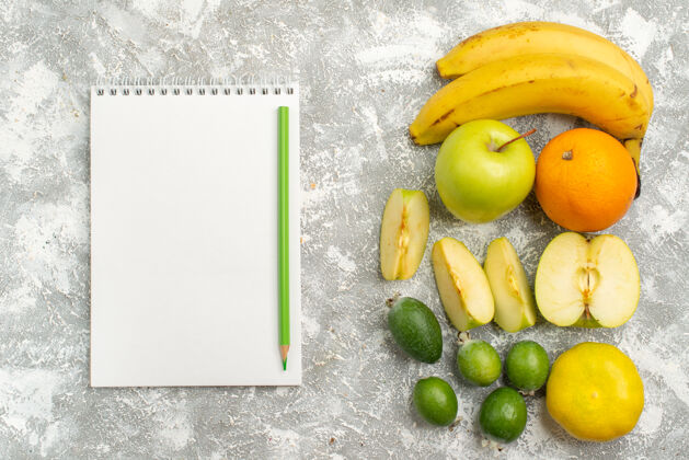 生的顶视图新鲜水果组成苹果 飞珠 香蕉等水果 白色背景 新鲜醇厚的水果 成熟的颜色 维生素背景肥肉颜色