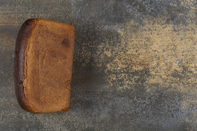 食品大理石桌上的美味面包小麦膳食面包房