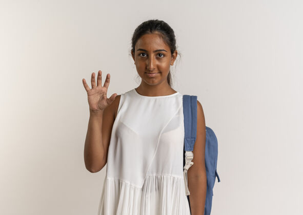学生年轻的女学生背着书包 手举五指表演女学生背包