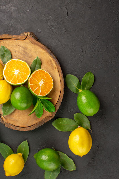 柠檬顶视图新鲜酸柠檬深色水果柑橘酸橙黄色顶部水果