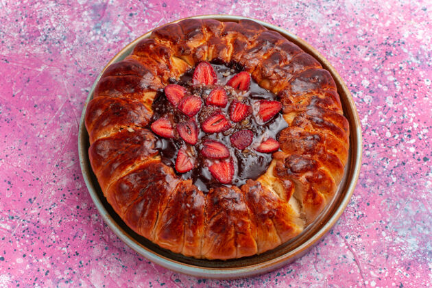 草莓顶视图美味草莓派水果蛋糕果冻和水果粉红派水果味蛋糕