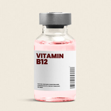 健康维生素b12注射液在一个玻璃瓶与粉红色的液体粉色剂量液体