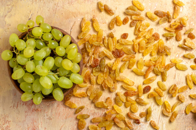 健康顶部特写查看葡萄绿色葡萄在碗和葡萄干多汁食品农业
