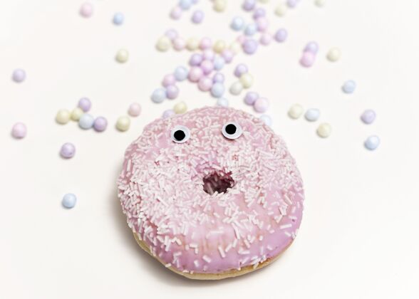 食物顶视图粉红釉甜甜圈情绪俯视图美味