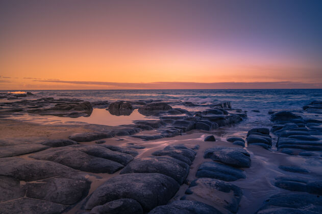 黎明澳大利亚昆士兰海岸美丽日落特写海岸季节度假