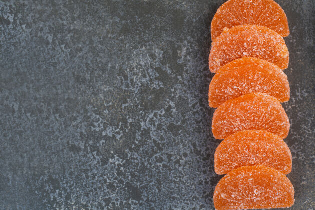 果冻橙色甜甜果冻果酱大理石背景高品质的照片食物糖橘子