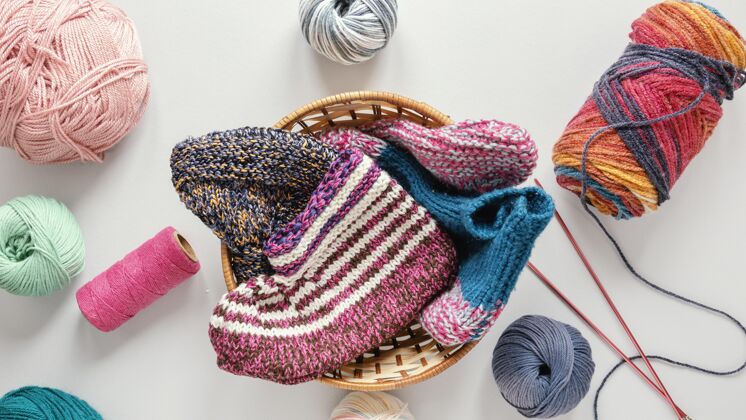 纺织品把编织针和羊毛放在篮子里纹理针织针编织机