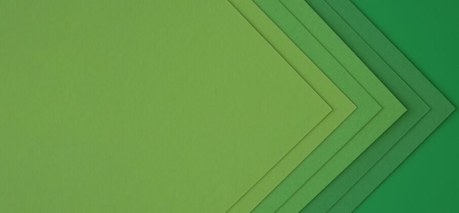 彩色层层叠叠的绿皮书创造出抽象的箭头室内艺术油漆
