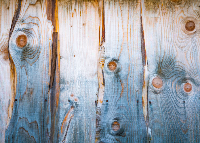 木工美丽的背景木墙与不寻常的木纹污渍过时桌子